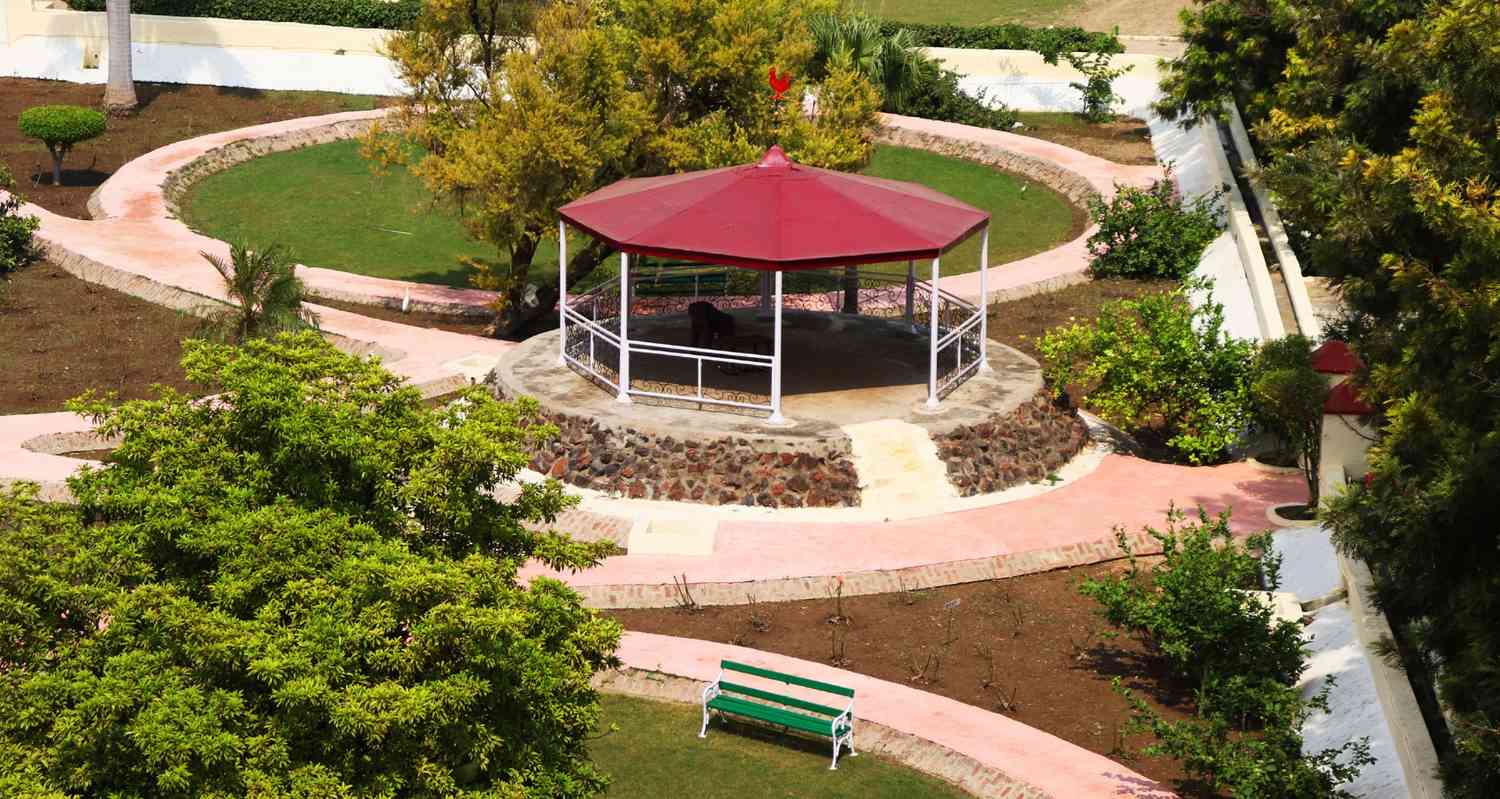 Gazebo in the garden at Kuchesar Fort, kids friendly resorts near Delhi
