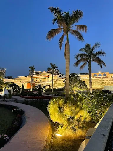 Beautiful evening view of Kuchesar Fort gardens, perfect for weekend getaways near Delhi.