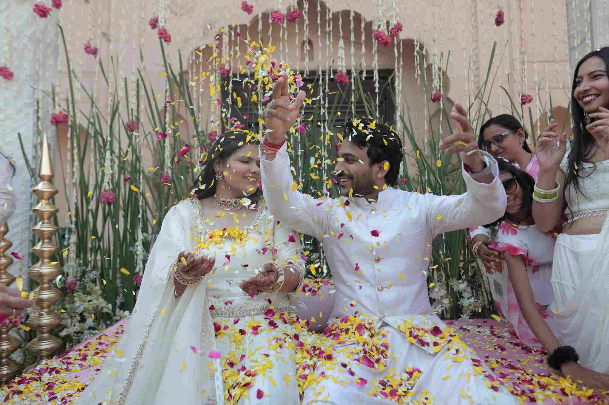 Couple celebrating flower ceremony at Kuchesar Fort – one of the best pre wedding shoot locations near Delhi
