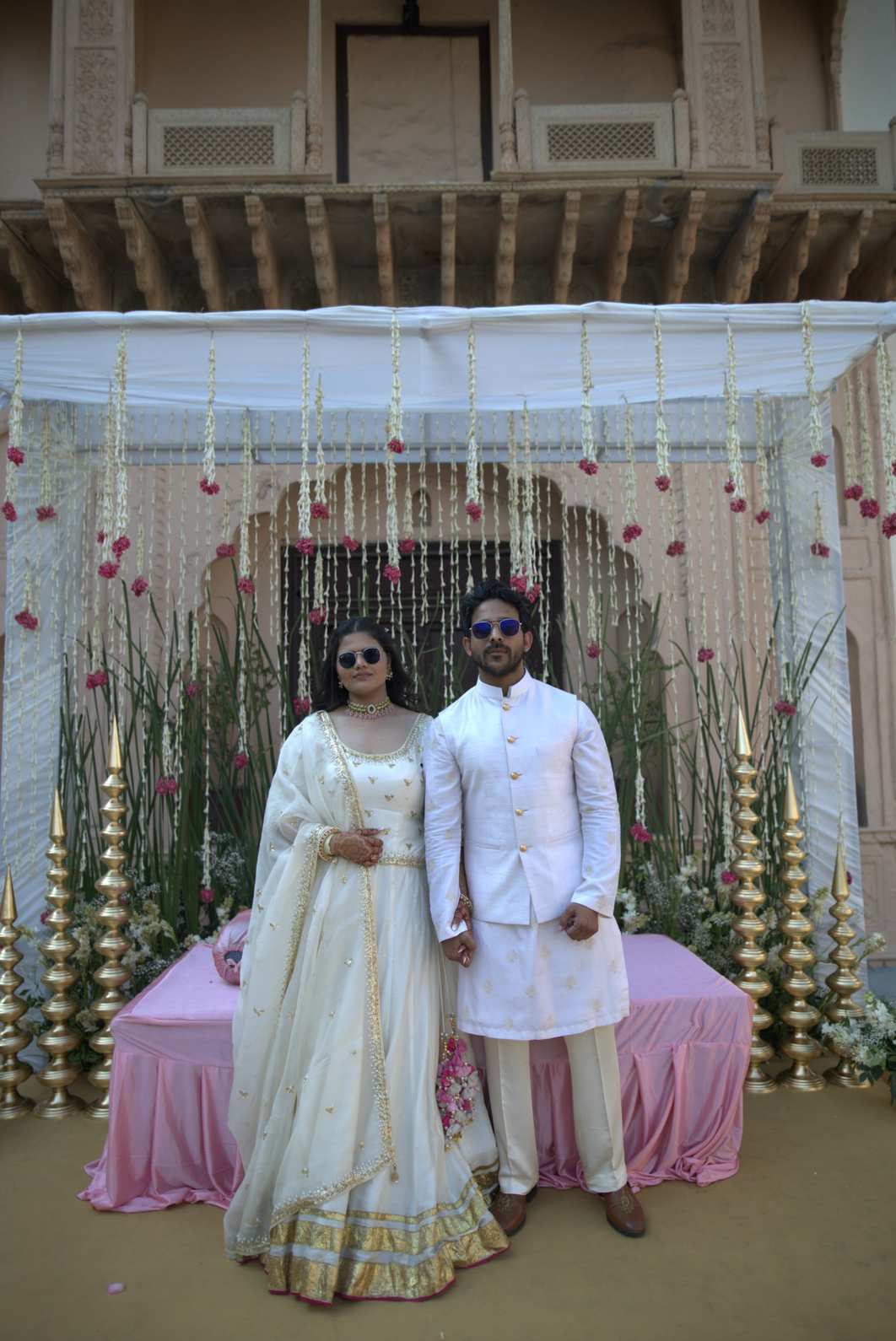 Wedding couple at Kuchesar Fort – a royal wedding destination near Delhi, beautifully decorated for a traditional Indian ceremony 